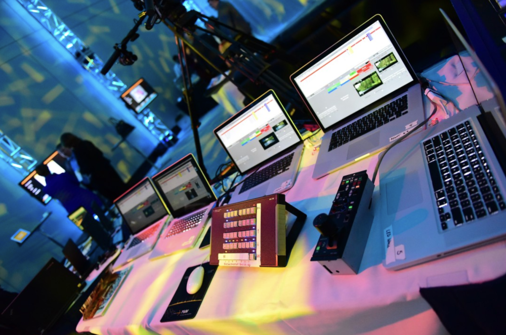 Image of computers being used for event production